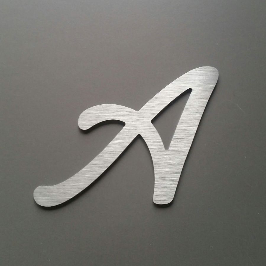 Brushed metal letter LOMBRIZ