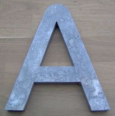 3D relief letter in zinc DIGITAL SANS