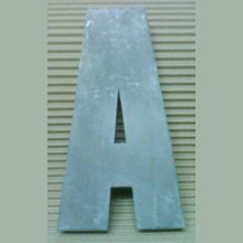 3D relief letter in zinc IMPACT